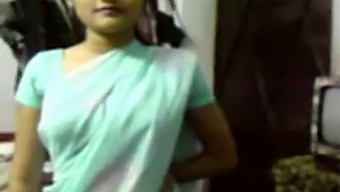 A Young Girl In Saree Enchanting.