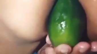 Stepmom Shows Off Her Open Ass By Fucking A Large Cucumber