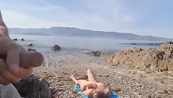 A Daring Man Exposes Himself To A Nudist Milf At The Beach, Who Eagerly Satisfies Him Orally.